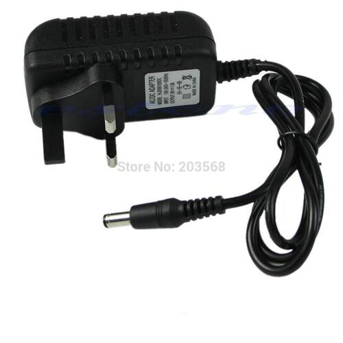 New AC 100-240V to DC 9V 1A Switching Power Supply Converter