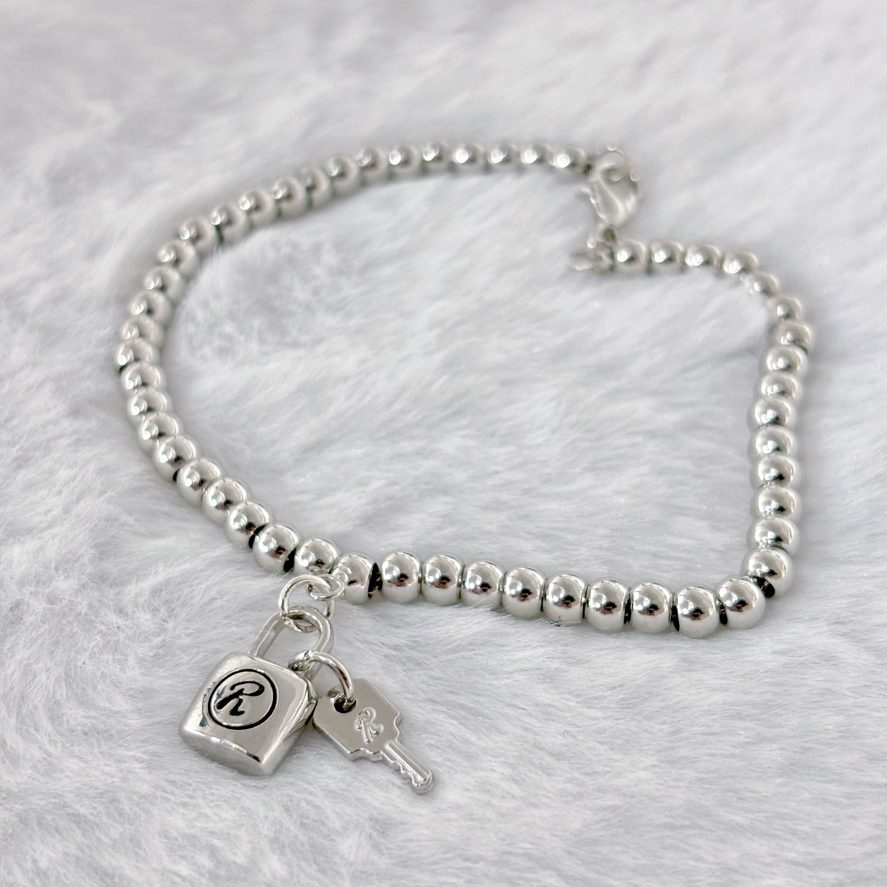 南京锁手链男女潮SID原版亮面朋克R锁情侣款定情圆珍珠手链