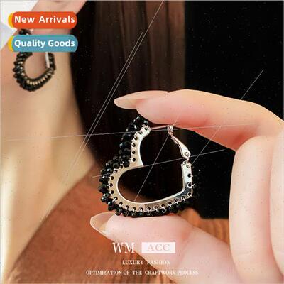 Skeletonized black beaded heart metal earrings earrings vers