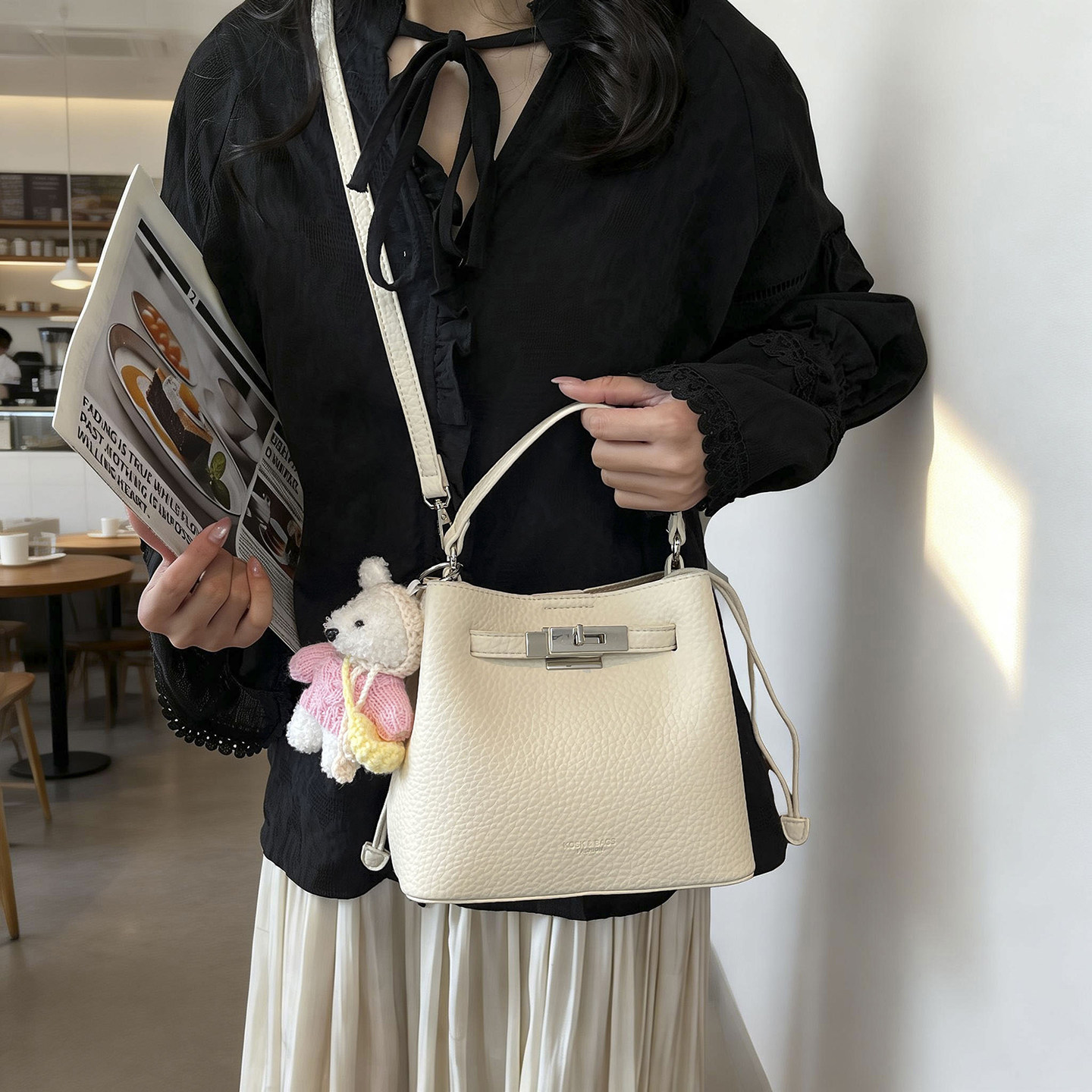 春风小铺女包荔枝纹水桶包包女士2026新款高级感通勤手提包斜挎包