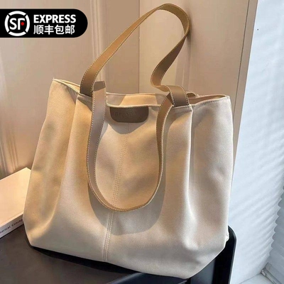 MUI日本通勤帆布单肩包2026新款