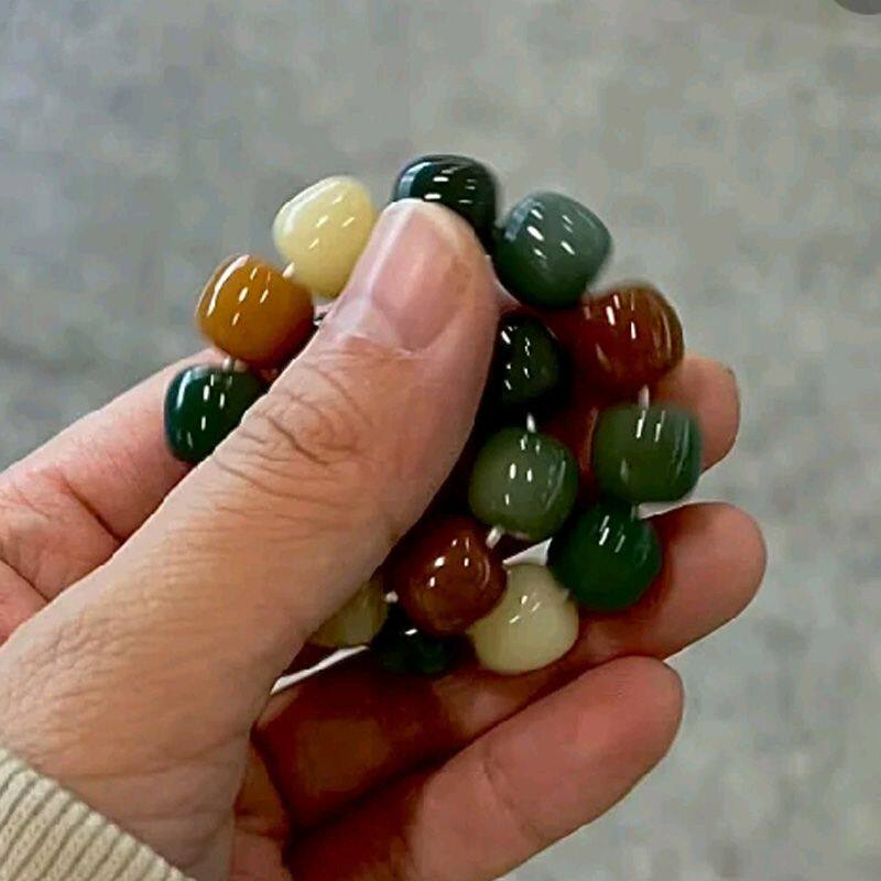 正月星月精品白玉菩提根手串女绕指柔文玩手链高货敦煌炭烧菩提子