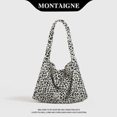 法国Montaigne 蒙田慵懒风碎花豹纹小众通勤大容量单肩韩系帆布包