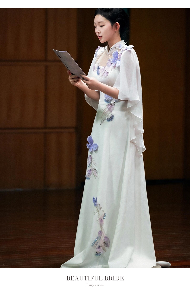 主持人礼服女2025新款白色重工轻奢音乐会独唱民族声乐舞台演出服