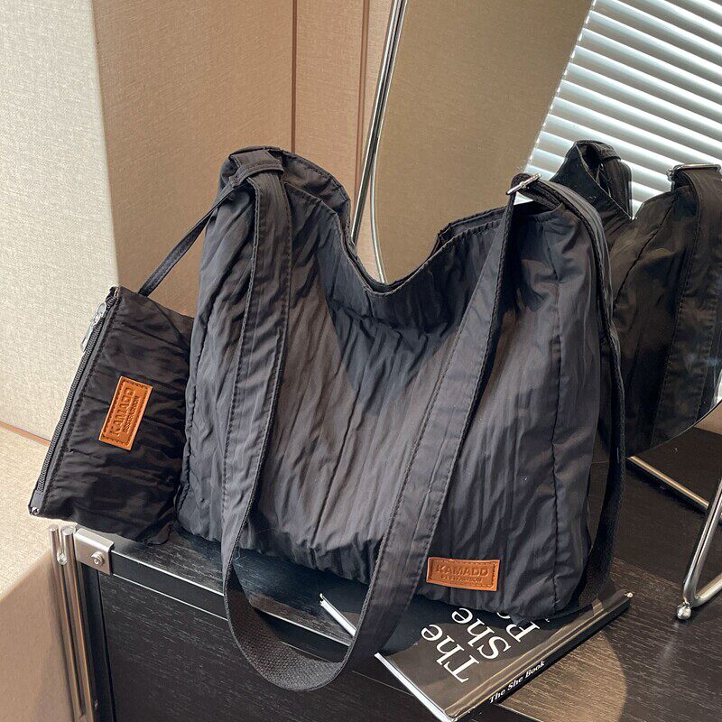 包包女2026新款通勤斜挎包大容量帆布包水桶高级感上课托节日礼品