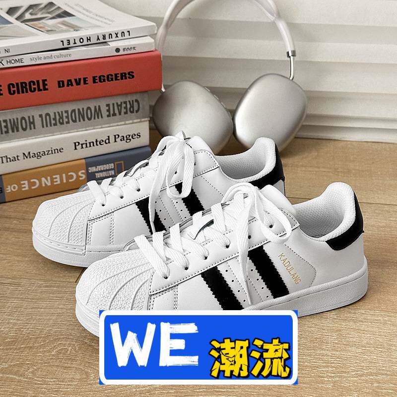 晋江乐橙体育男鞋贝壳头滑板鞋小黑鞋复古休闲学生鞋街拍运动鞋女