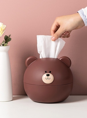 Home-owned paper towel box home with a living room cup of te