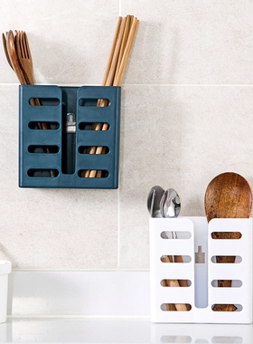 Two pairs of chopstick cages with chopsticks on the walls of
