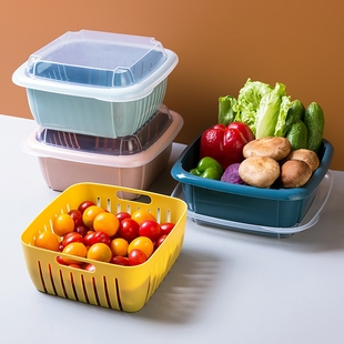 In the kitchen, two-story leaching bowls of fruit baskets ar