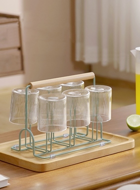 We'll have a glass cup of tea in the living room, and we'll