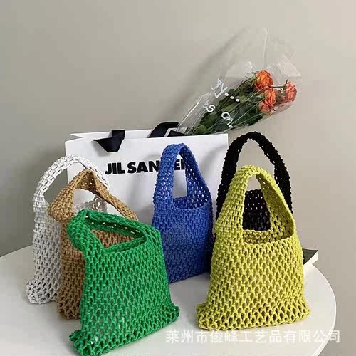 Hand woven hollow out handbag klein blue beach bags