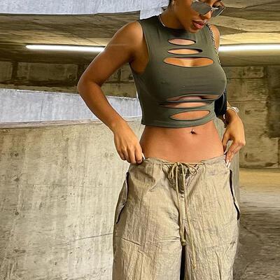 Solid color tight cutout sleeveless vest纯色紧身镂空无袖背心