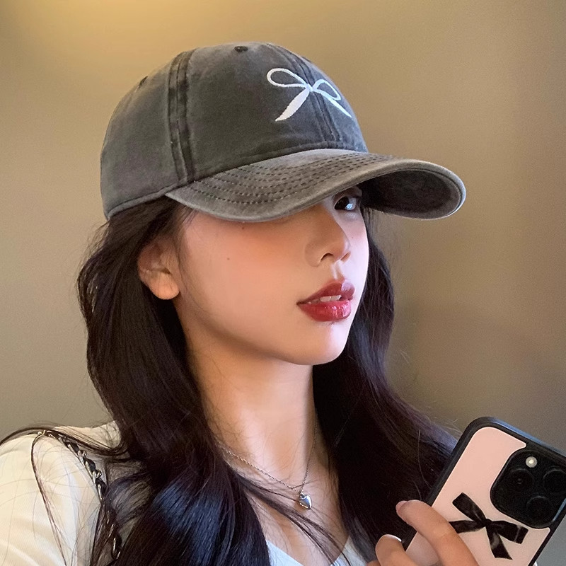 复古灰色鸭舌帽子女夏季蝴蝶结刺绣春秋水洗做旧宽檐显脸小棒球帽