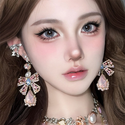 粉色夸张珍珠蝴蝶结耳环女