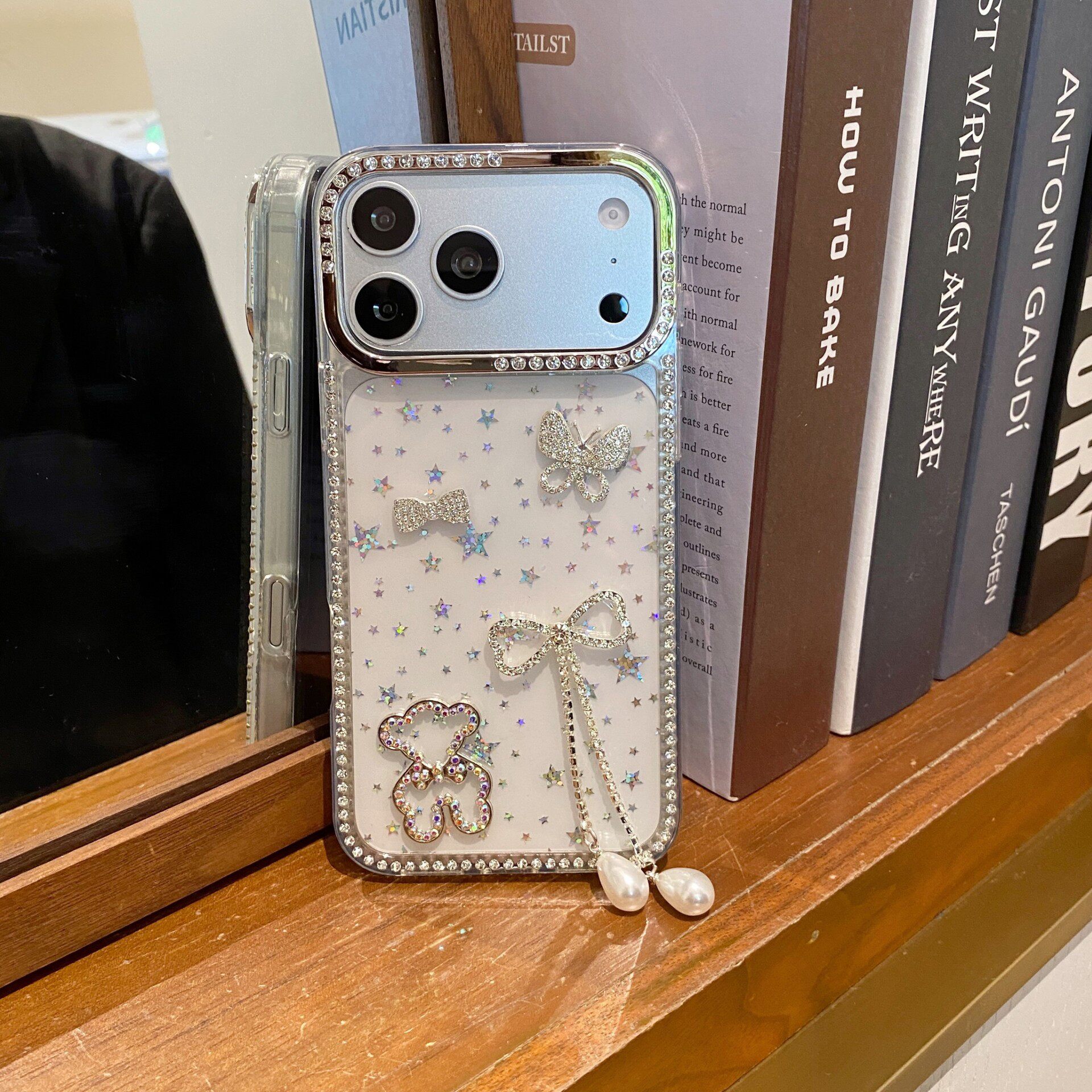 蝴蝶结流苏渐变星星壳适用苹果16promax手机壳iPhone1