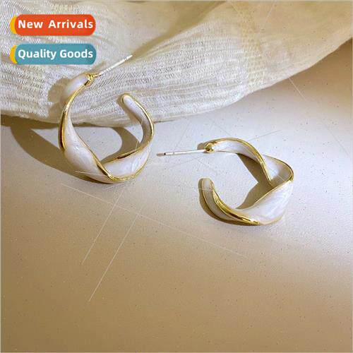 Korea French irregular spiral cream whe earrings female new