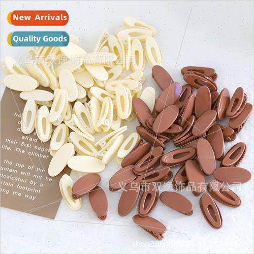 Beige curry color oval duckbill clip -metallic girl bangs br