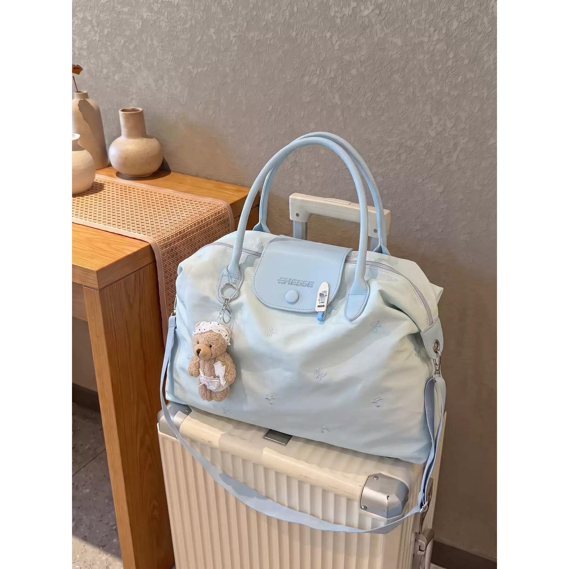 高颜值浅蓝色大容量旅行包女可斜挎轻便短途旅游包收纳出差行李包