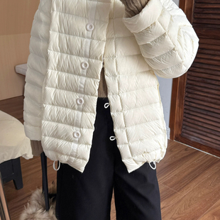 馨菲冬上新休闲百搭圆领单排扣宽松保暖羽绒服外套5071