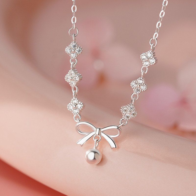 足银S999淡雅四叶花蝴蝶结项链女甜美温柔淡雅气质小众锁骨链