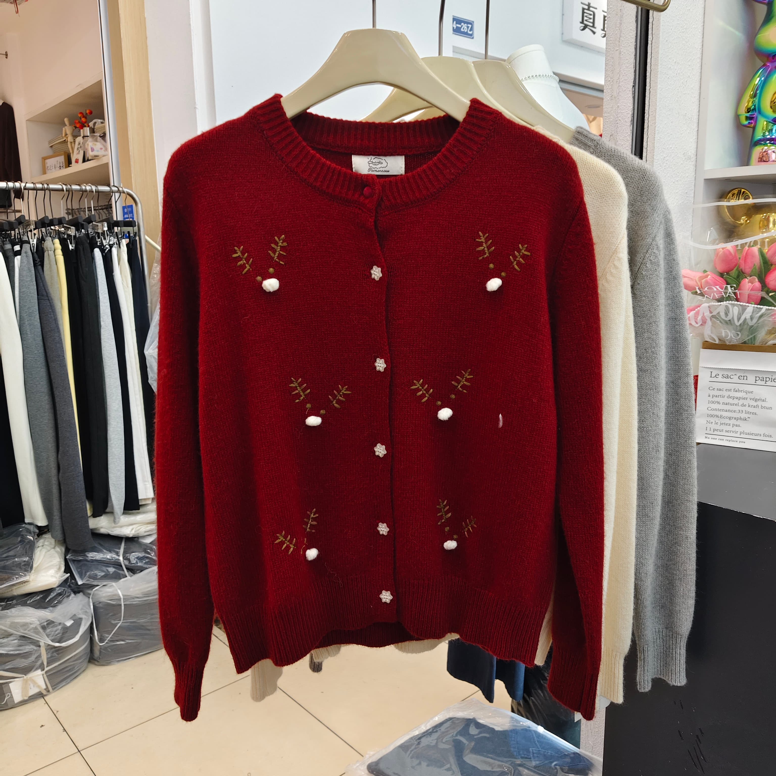 单排扣浣熊绒圆领针织开衫女