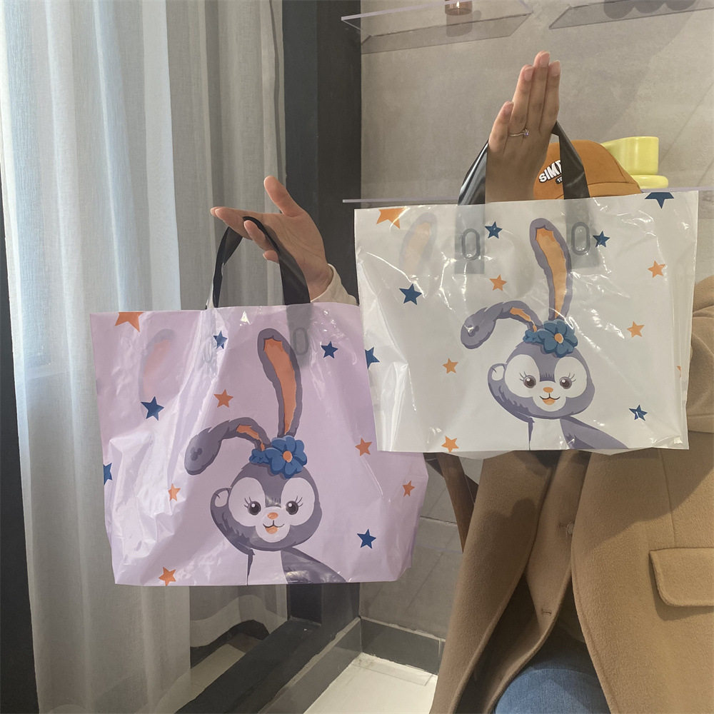 可爱卡通塑料女装儿童服装店用白色兔子手提包装购物袋可爱礼品袋
