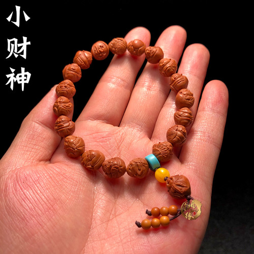小籽财神龙纹桃核手串
