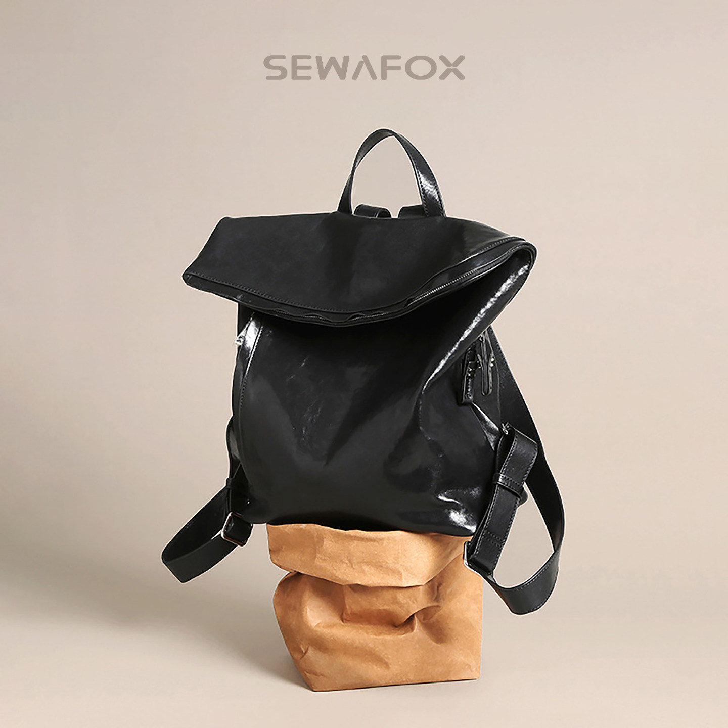 高级感小众双肩包女新款不对称设计感背包通勤电脑包皮质学生书包