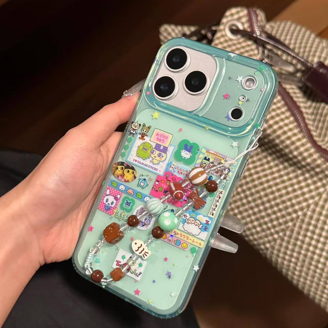 大孔设计透绿色拓麻歌子适用iPhone17promax手机壳15新款17pro网红女款13创意全包防摔16pro超好看17保护套