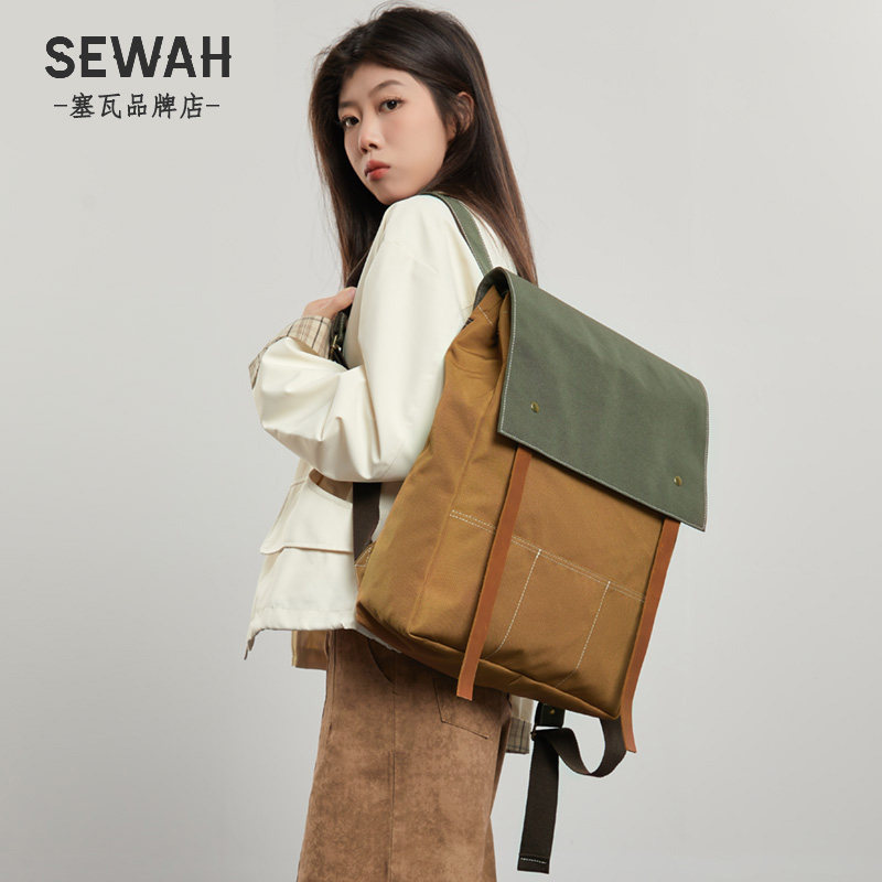 男女帆布双肩包大容量旅游轻便学生书包2025新款男款通勤电脑背包