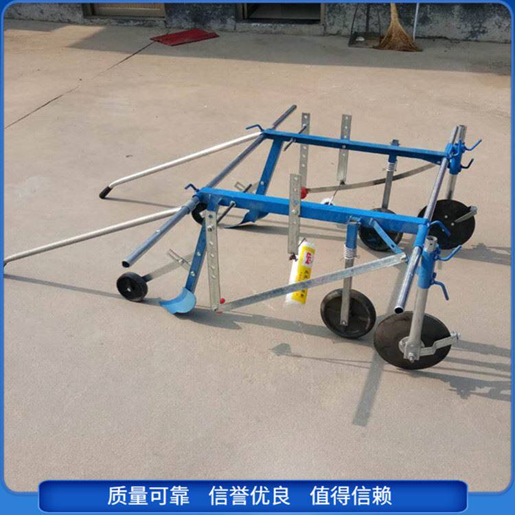 人力覆膜机 新款宽窄可调农用小型多用途铺膜压膜机