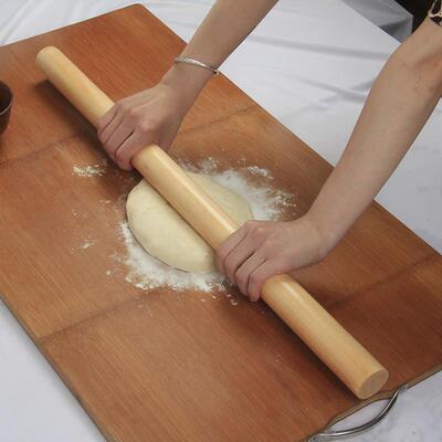 A large wooden roller rolling pin roll rod surface wooden