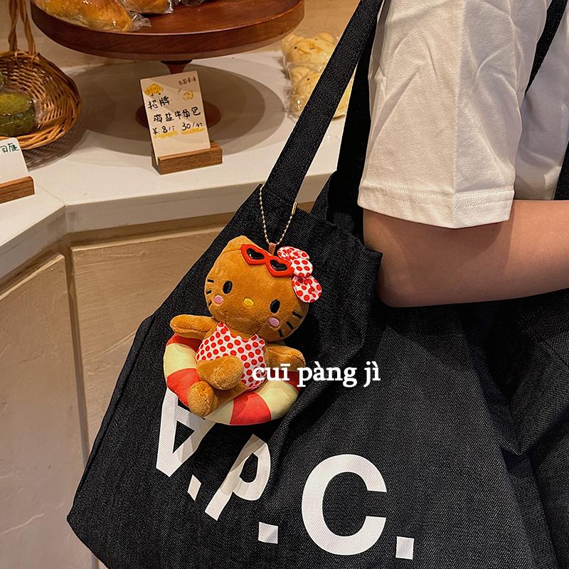 可愛夏威夷黑皮泳圈kt貓包包掛件