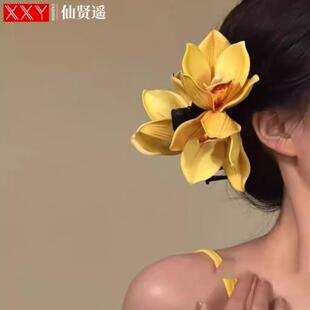 氛围感蕙兰花超仙仿真花抓夹女鲨鱼夹发饰后脑勺抓夹旅游自拍头饰