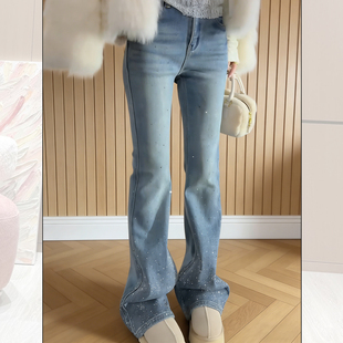 浅蓝色重工烫钻牛仔裤女2025新款冬季加绒加厚亮闪闪高腰微喇长裤