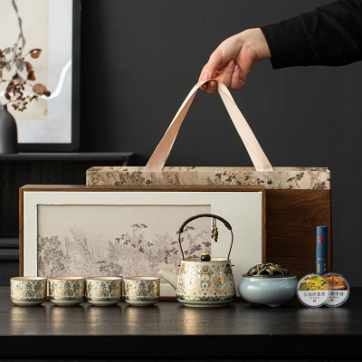 High end Dunhuang gold and silver crossbeam teapot tea set company annual meeting gift for home use Kung Fu tea set bus