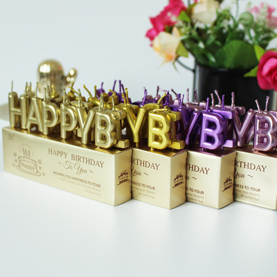 13 gold-plated scattered letter candles in a PVC box with golden letters, decorated with cake inserts and birthday cand