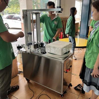 南庄全自动胶带缠绕机罗村纸箱胶带裹包机泡沫箱自动脚踏缠膜机