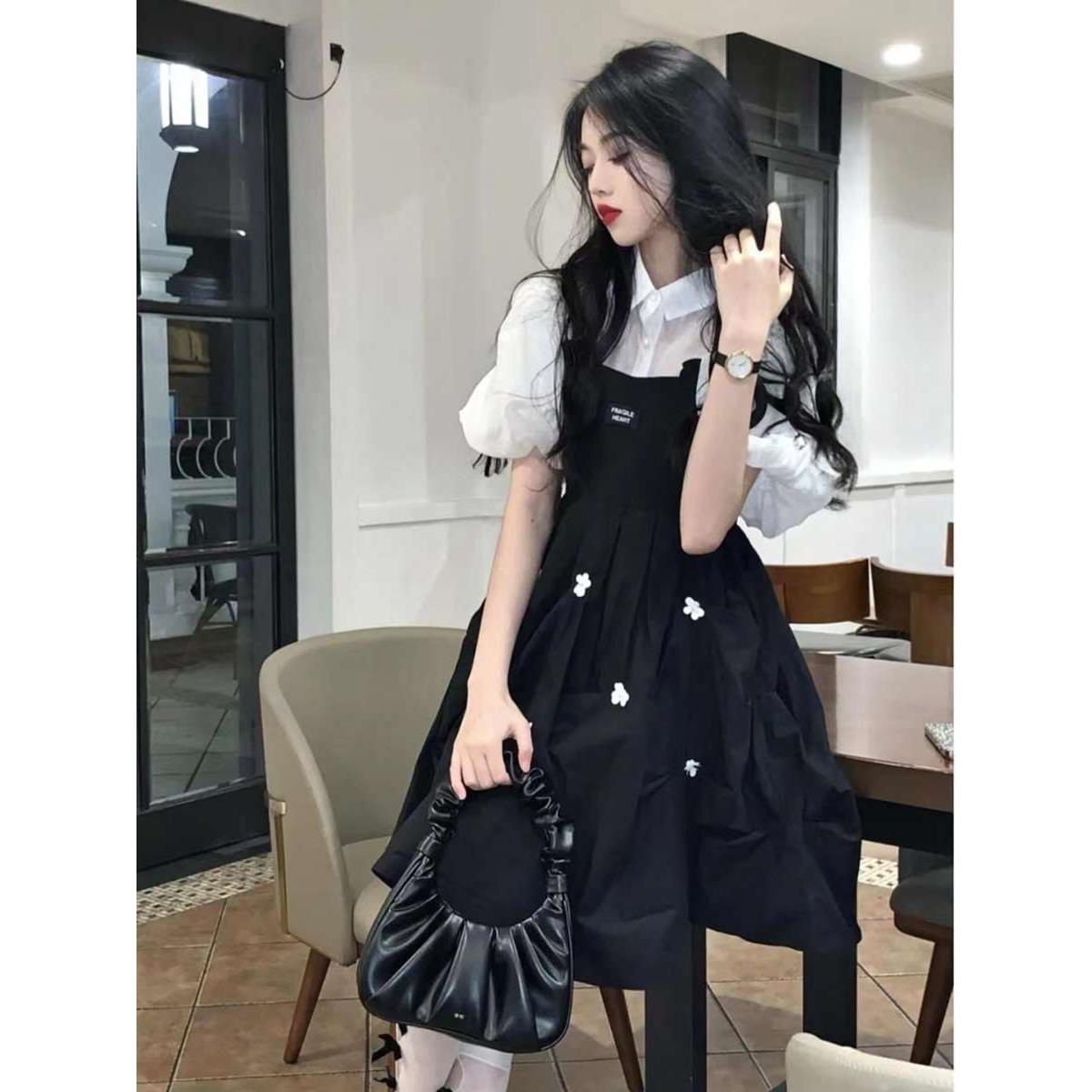 茶歇法式黑色吊带连衣裙女夏季设计感小花背带裙学院赫本风小黑裙