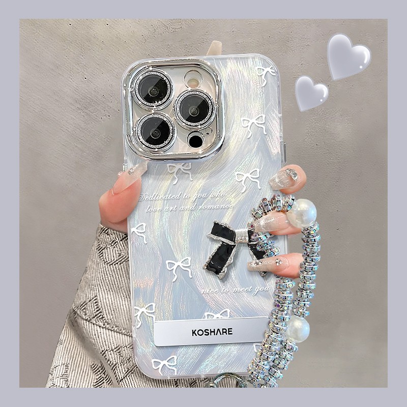 蝴蝶结公仔适用苹果17手机壳女iphone16新款华为nova14高级mate70荣耀400手链vivoS30红米K80防摔小米保护套