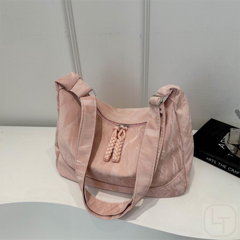 大容量包包女式2025新款百搭单肩包女款大包饺子包通勤斜挎包