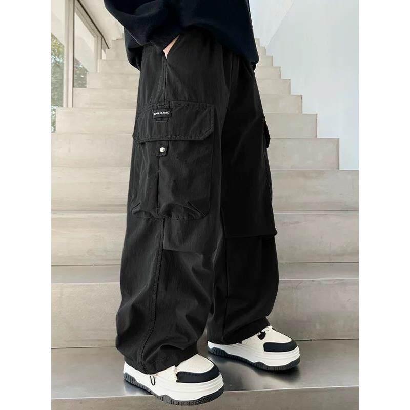 男童工装裤春秋2025新款儿童秋季黑色裤子休闲裤中大童直筒阔腿裤