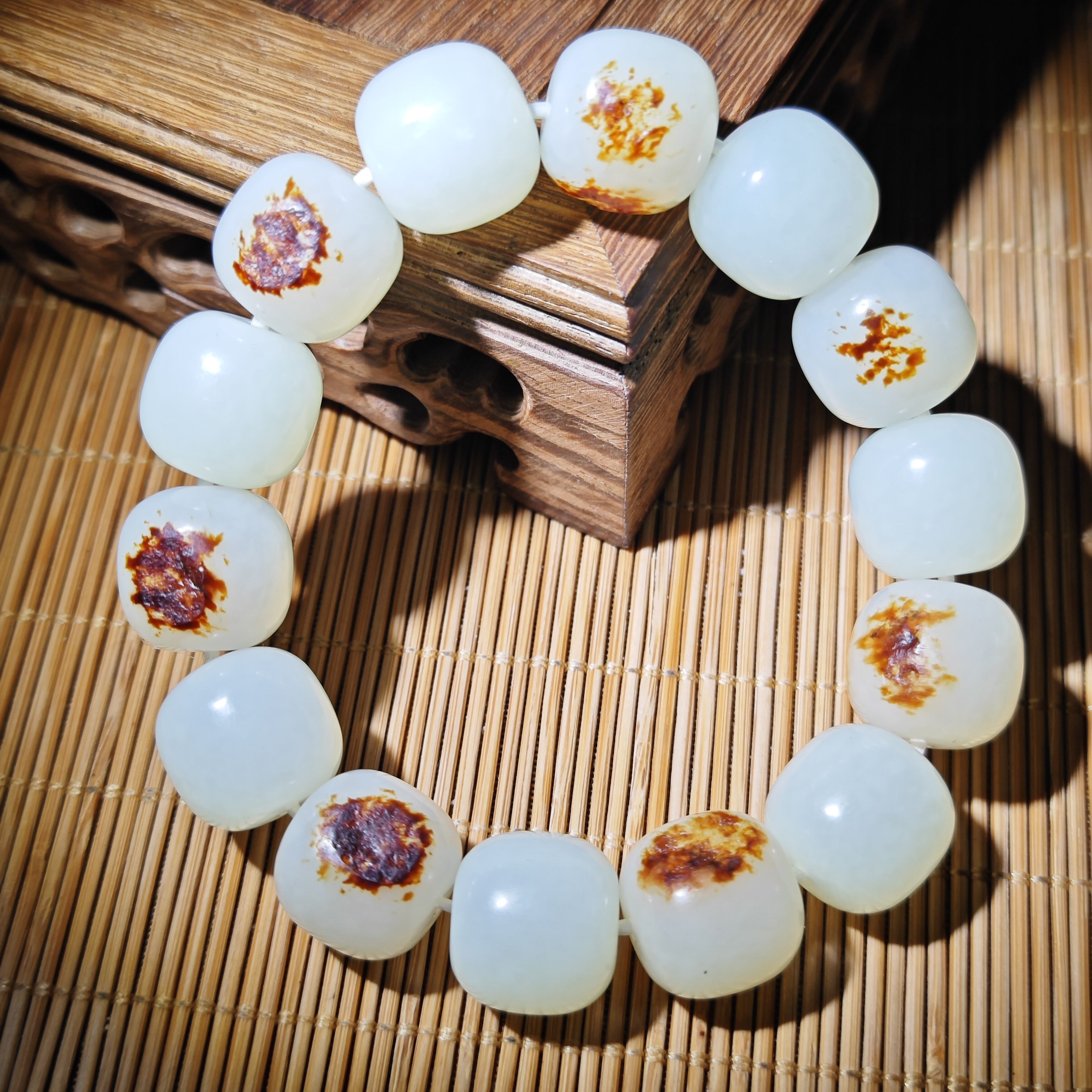 一诺珍品新疆和田玉籽料羊脂白洒金皮15*16mm老型珠保真高档手串
