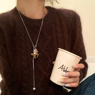 闪锆咖色木马吊坠可抽拉项链女小众大气长款颈链高级感毛衣链配饰