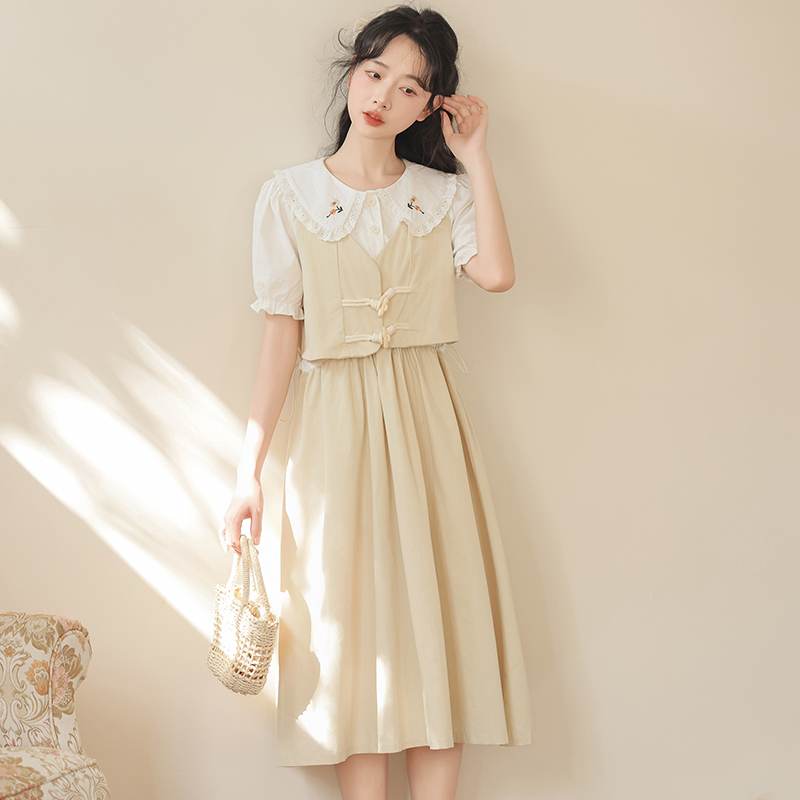 少女新中式牛角扣连衣裙2025夏季新款初中高中学生假两件气质长裙