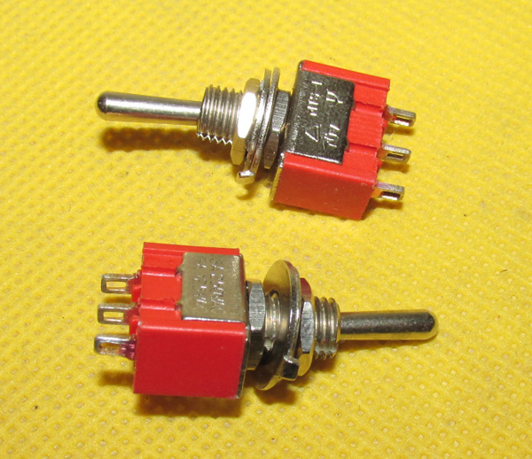 东迅镀银脚拨动式钮子开