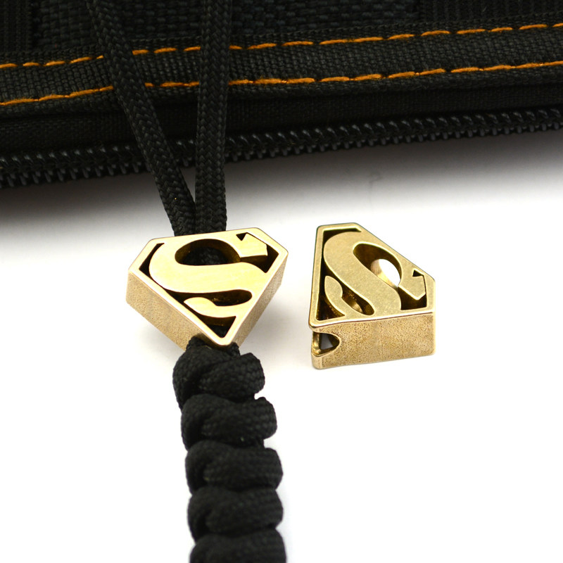 黄铜刀坠EDC 美国队长图案CNC制作 伞绳刀坠 挂坠黄铜刀坠吊坠,搬运/仓储/物流设备,其他起重搬运设备,淘宝优惠券,粉丝福利购,淘宝优惠卷