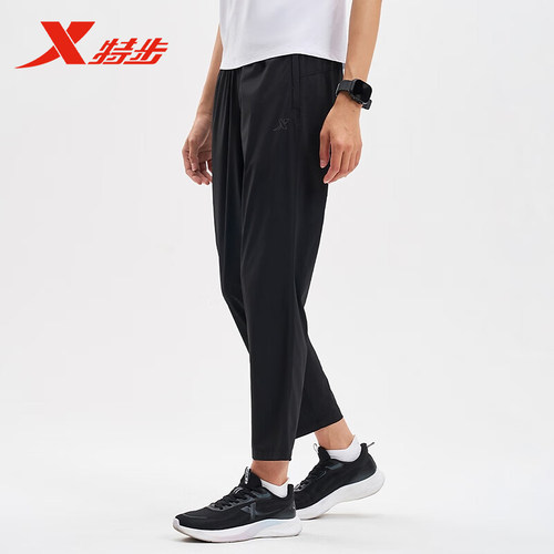特步梭织九分裤女2025夏季新款薄款跑步休闲运动长裤975228690236