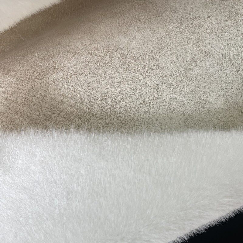 仿貂毛复合布仿狐狸毛仿獭兔毛绒布羊毛皮釉一体坎肩服装原料布匹