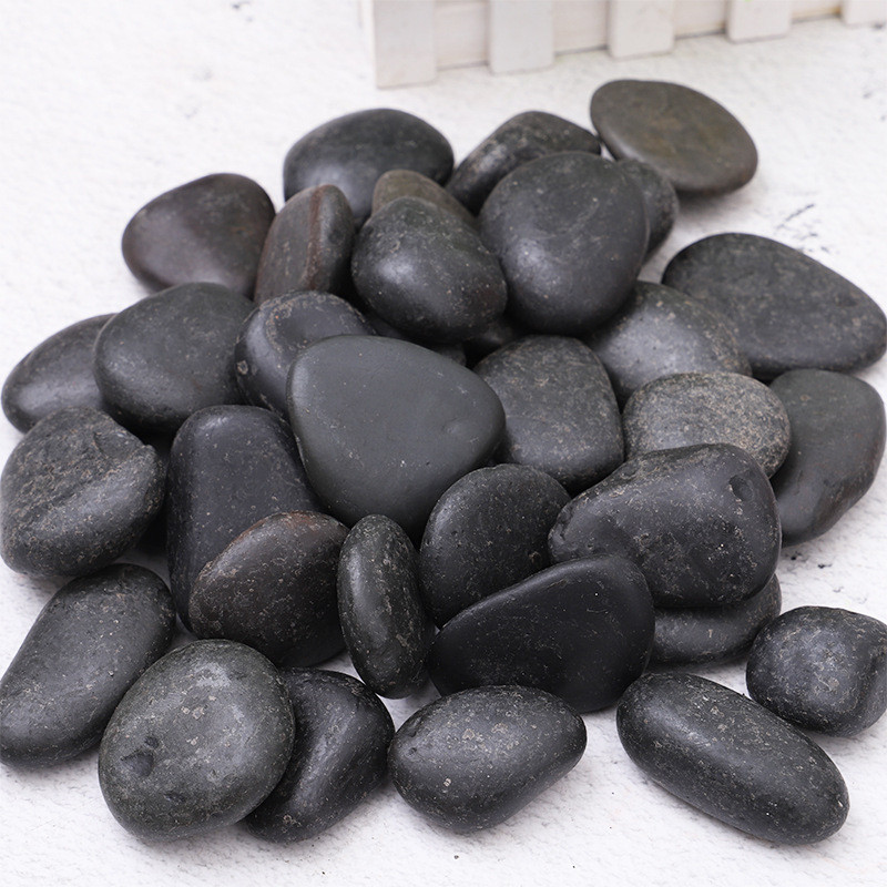 黑色抛光鹅卵石工程铺路园林景观高光雨花石水池鱼缸造景石头